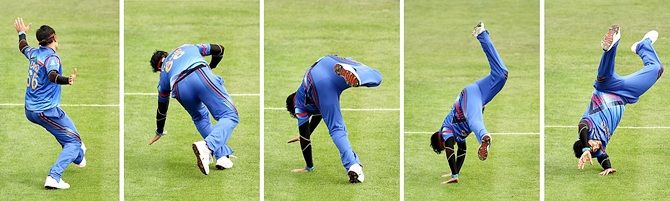 Hamid Hassan of Afghanistan does a cartwheel to celebrate the wicket of Kumar Sangakkara 
