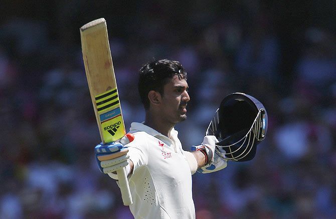 Lokesh Rahul celebrates after completing his century