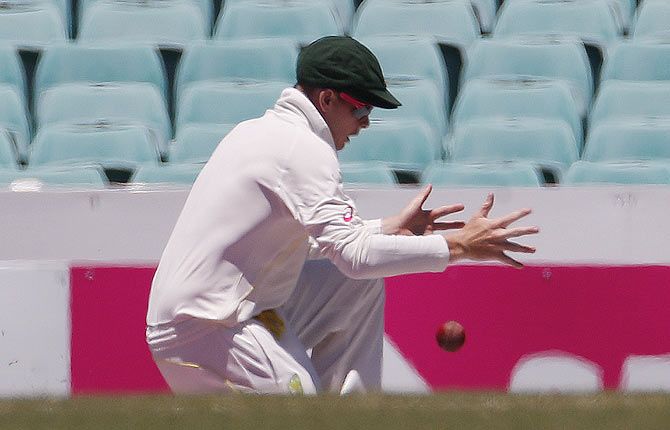 Australia's captain Steven Smith drops a catch from India's Lokesh Rahul during the third day's play in the fourth Test at the Sydney Cricket Ground (SCG) January 8