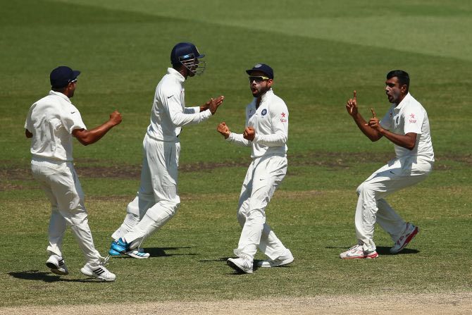 Test Captain Virat Kohli, second from right, and Ashwin, right, work in tandem to bamboozle the opposition. Photograph: Cameron Spencer/Getty Images