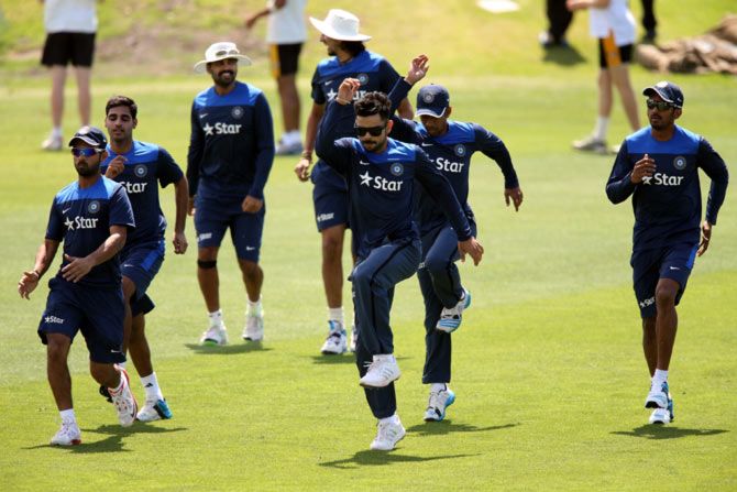 India's players warm up