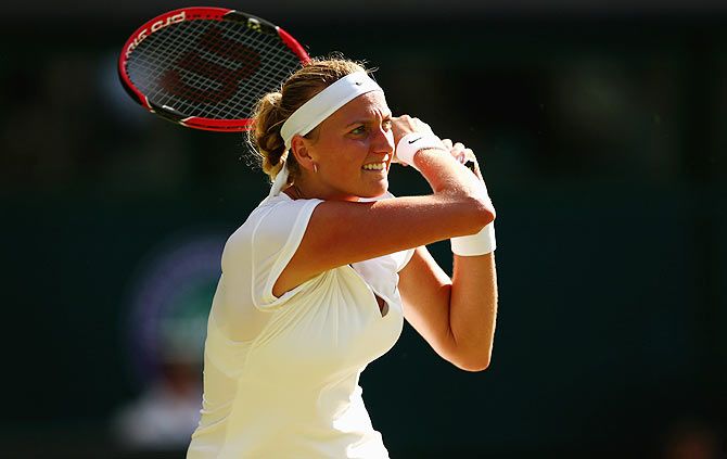  Petra Kvitova of Czech Republic plays a backhand in her Ladies' Singles third Round match against Jelena Jankovic of Serbia