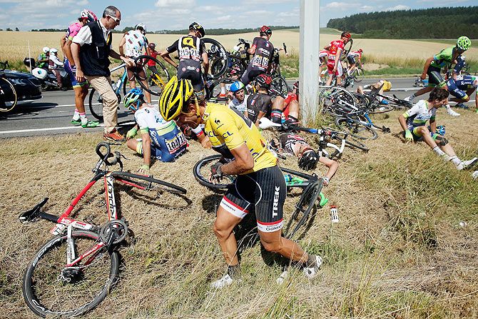 Switzerland's Fabian Cancellara riding for Trek Factory Racing collects himself after being involved in a crash during stage three of the 2015 Tour de France on Monday
