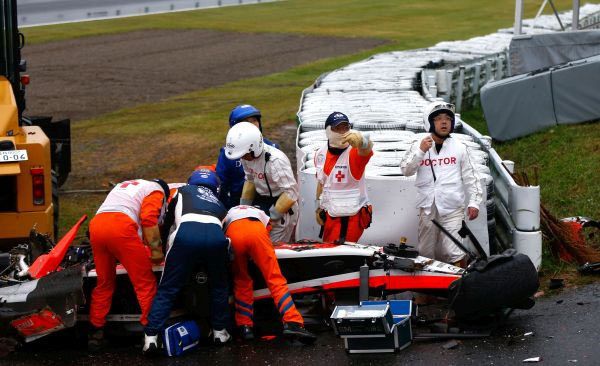 Jules Bianchi of France and Marussia receives urgent medical treatment after crashing during the Japanese Formula One Grand Prix in October