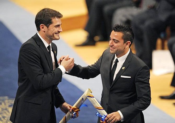 Spanish players Iker Casillas (left) and Xavi Hernandez