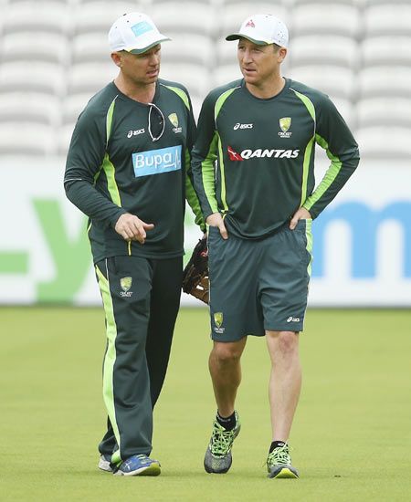 Australian Team Psychologist Michael Lloyd speaks with wicket-keeper Brad Haddin during a nets session ahead of the 2nd Ashes Test match against England at Lord's Cricket Ground on Tuesday