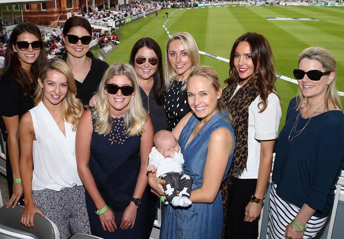  Back Row (Left to Right): Isabelle Platt, partner of Mitchell Marsh, Jessica Johnson, wife of Mitchell Johnson, Melissa Waring, partner of Nathan Lyon, Dani Willis, partner of Steve Smith, Kyly Clarke, wife of Michael Clarke, and Kristy Voges, wife of Adam Voges. (Front row Left-Right) Bec O'Donovan, wife of Shaun Marsh, Sam Nelson, fiance of Peter Nevill and Cherie Harris, wife of Ryan Harris holding their son Carter, pose on Day 1 of the 2nd Ashes Test match at Lord's Cricket Ground on Wednesday, July 16
