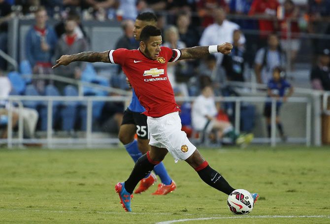 Manchester United's Memphis Depay (right) drives the ball during the first half of his International Champions Cup match against San Jose Earthquakes at Avaya Stadium in San Jose, California, on Tuesday