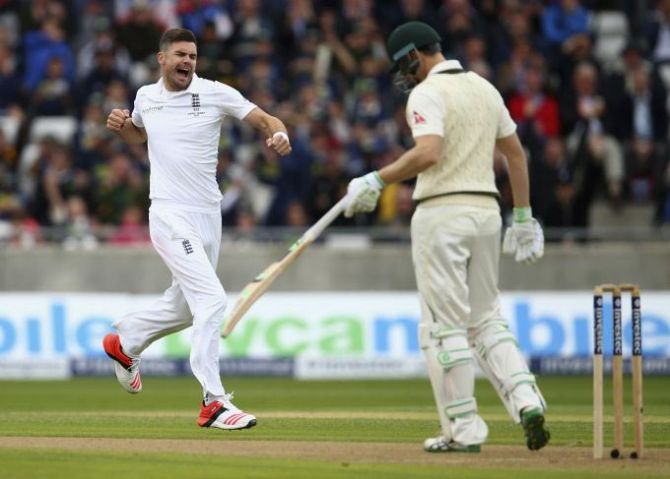 England's James Anderson celebrates after taking the wicket of Australia's Adam Voges