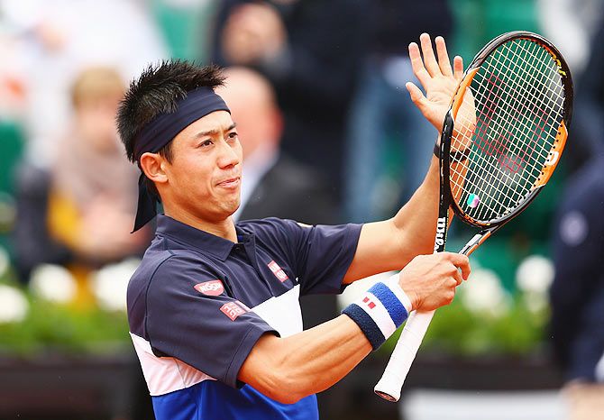 Kei Nishikori celebrates victory over Teymuraz Gabashvili