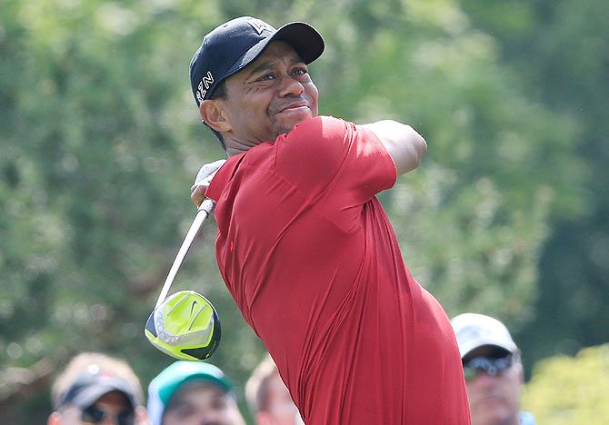 USA's Tiger Woods plays a shot on the 15th hole during the final round of The Memorial Tournament presented by Nationwide at Muirfield Village Golf Club in Dublin, Ohio, on Sunday