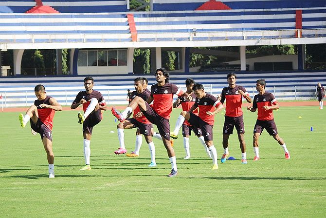 India's Sandesh Jhinghan (centre) leads the team at a traning session