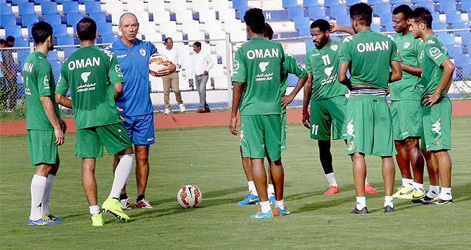 Oman coach Paul Le Guen talks to players during training session in Bengaluru on Tuesday