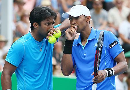 Leander Paes of India (L) and Raven Klassen of South Africa 