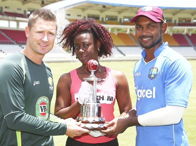 Michael Clarke of Australia and Denesh Ramdin of West Indies pose with the Frank Worrell Trophy