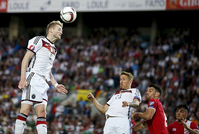 Germany's Andre Schurrle heads the ball during their Euro 2016 qualifying match against Gibraltar at Algarve stadium in Faro, Portugal on Saturday