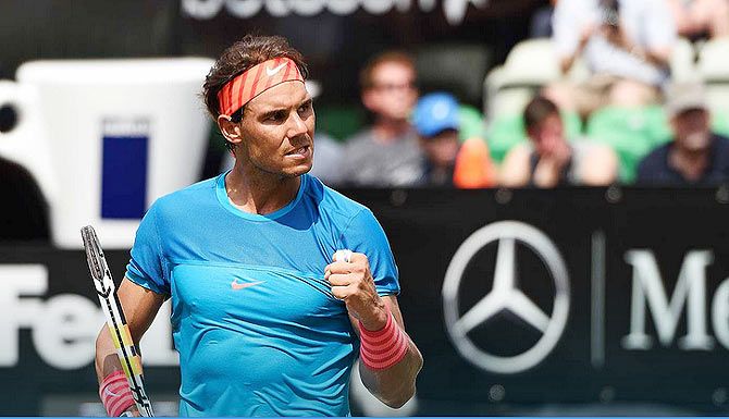 Rafael Nadal reacts on winning a point