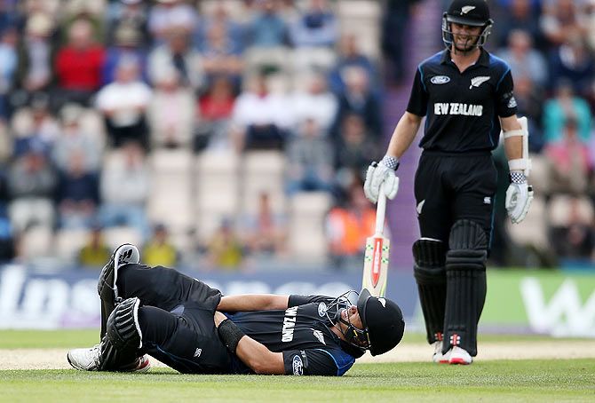 New Zealand'S Ross Taylor goes down in pain after being struck off the bowling of England'S Ben Syokes during his innings of 110 runs
