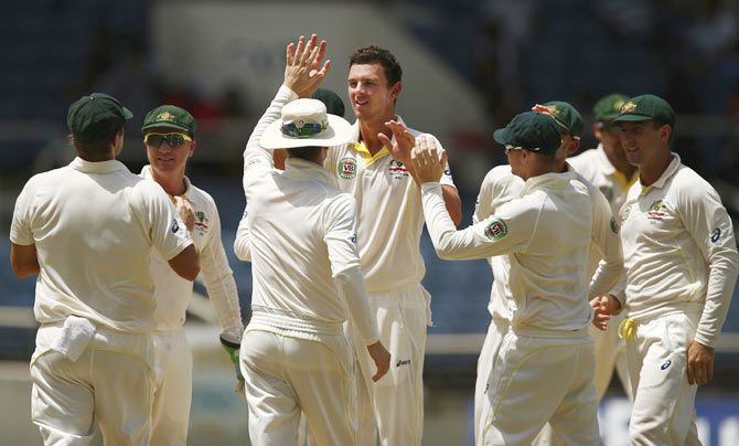 Australia's Josh Hazlewood celebrates after taking the wicket of West Indies' Jermaine Blackwood in the second Test on Sunday