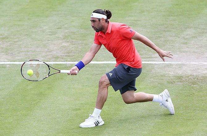 Cypriot Marcos Baghdatis in action against Spanish David Ferrer on day three of the Aegon Open Nottingham at Nottingham Tennis Centre on Tuesday