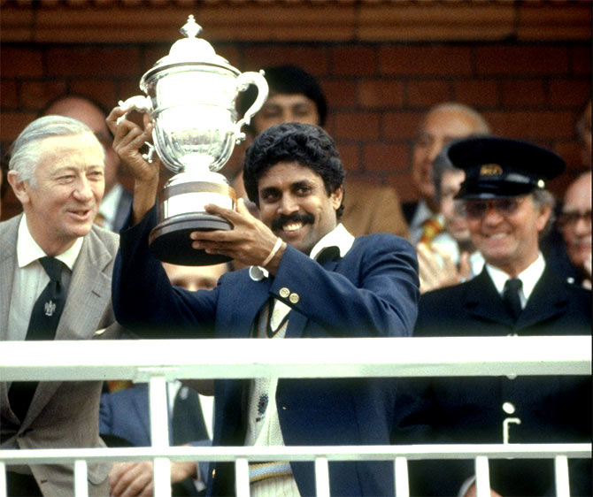 Captain Kapil Dev holds aloft the trophy after India won the 1983 World Cup