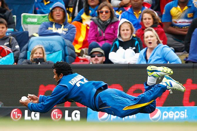 Dimuth Karunaratne of Sri Lanka catches out Kane Wlliamson of New Zealand during their match at Hagley Oval in Christchurch, on February 14