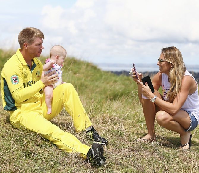 David Warner of Australia, his fiance Candice Falzon and their daughter Ivy