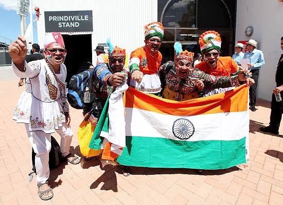 Indian fans dressed in traditonal Indian costumes before the match on Friday