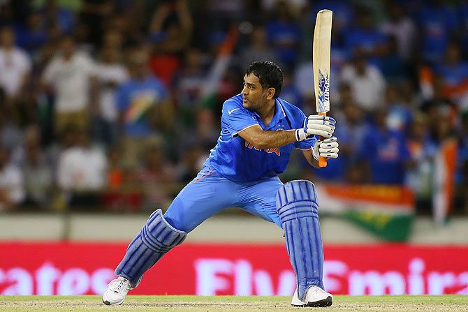 India captain Mahendra Singh Dhoni hits the winning runs against the West Indies at the WACA in Perth on Friday