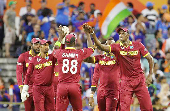 West Indies players celebrates the wicket India's Shikhar Dhawan
