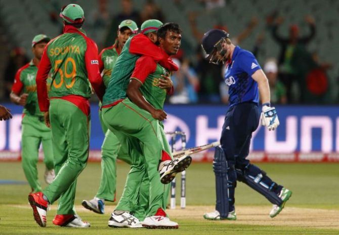 Bangladesh bowler Rubel Hossain (centre) and team mates Soumya Sarker (left) and Taskin Ahmed react after England captain Eoin Morgan