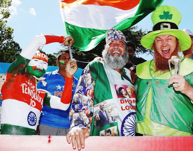 Sudhir Kumar Choudhary, left, with Indian and Irish fans
