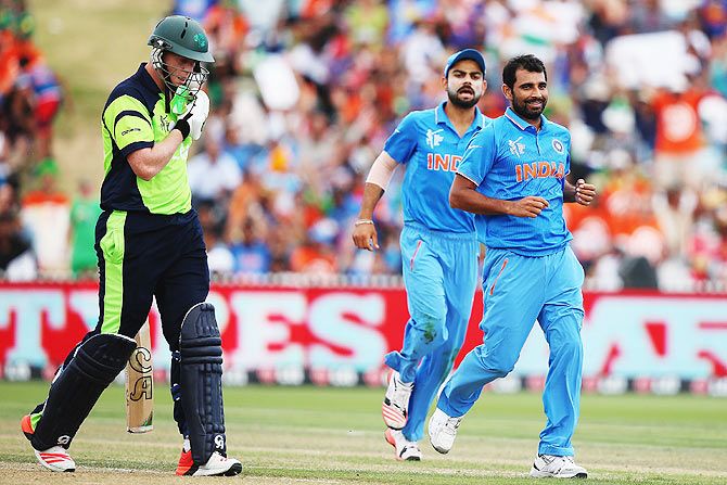 India's Mohammed Shami celebrates the wicket of Ireland's Kevin O'Brien during their 2015 ICC World Cup match at Seddon Park in Hamilton on Tuesday