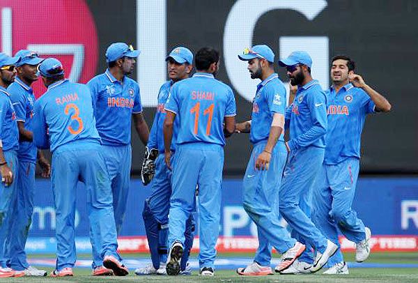 India players celebrate the wicket of Ireland's Niall O'Brien