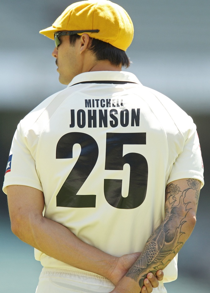 A tattoo adorns the arm of Mitchell Johnson