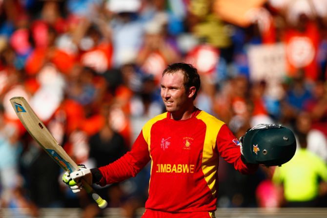 Brendan Taylor salutes the crowd as he leaves the field after scoring 138 runs. Photograph: Phil Walter/Getty Images