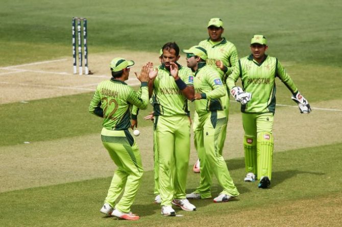 Wahab Riaz of Pakistan is congratulated by teammates