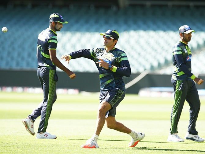 Pakistan captain Misbah ul Haq throws the ball during a nets session