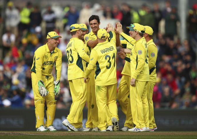 Australia's Mitchell Starc celebrates after picking up a wicket during the World Cup Pool A game against Scotland, being played in Bellerive Oval