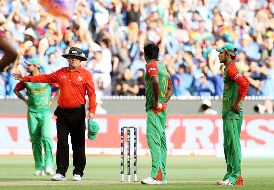 Bangladesh players reacts to a no ball given by umpire Ian Gould during the quarte-final againsy India on Wednesday