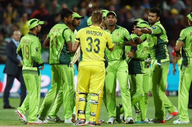 Pakistan players shake hands with Australian players