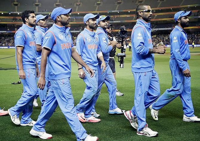India's cricket team walk off the field following their 109-run Cricket World Cup quarter-final win over Bangladesh in Melbourne last week