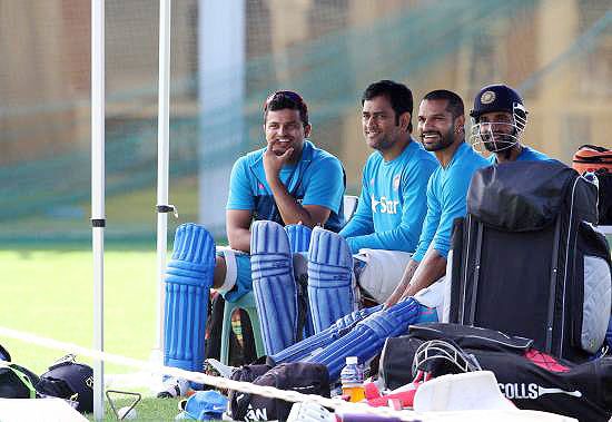 India's Suresh Raina, captain Mahendra Singh Dhoni, Shikhar Dhawan and Ajinkya Rahane during a practice 