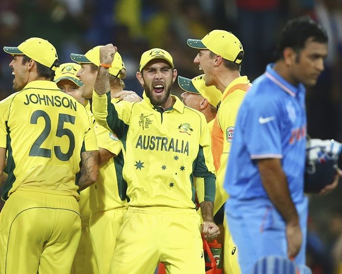 Glenn Maxwell celebrates after Mitchell Starc took Ajinkya Rahane's wicket. Photograph: Ryan Pierse/Getty Images