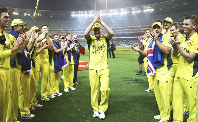 Players form a guard of honour for Michael Clarke of Australia as he leaves the   field 
