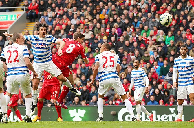 Steven Gerrard of Liverpool scores the winning goal with a header during the Barclays Premier League match between Liverpool and Queens Park Rangers at Anfield on Saturday