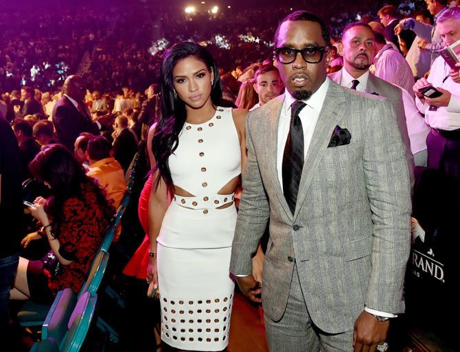 Model Cassie Ventura (left) and Sean 'Diddy' Combs pose ringside