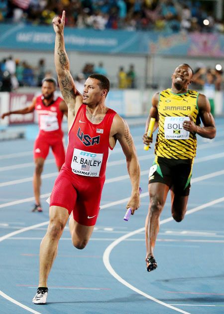 Ryan Bailey of the United States celebrates after out-running Jamaica's Usain Bolt to win the final of the men's 4 x 100 metres on day one of the IAAF World Relays at Thomas Robinson Stadium in Nassau, Bahamas, on Saturday