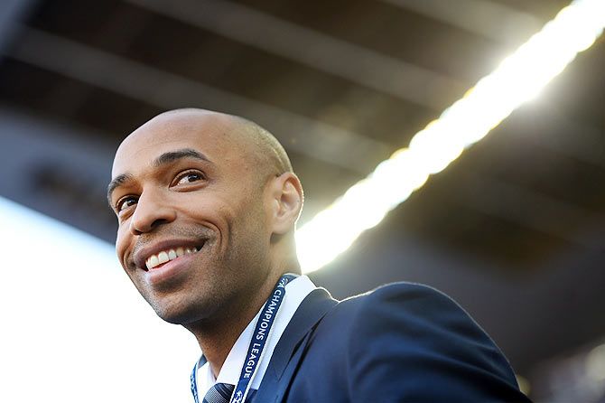Former Arsenal and Barcelona player and TV commentator Thierry Henry looks on prior to kickoff of the UEFA Champions League first leg semi-final between FC Barcelona and FC Bayern Muenchen at Camp Nou in Barcelona on Wednesday