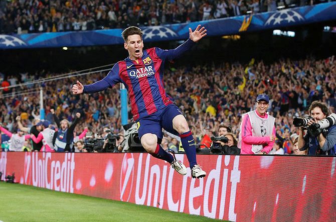 Barcelona's Lionel Messi celebrates scoring their second goal